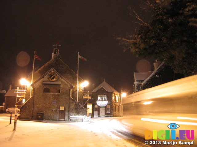 SX25862 Car driving through snow by Town Hall Llantwit Major